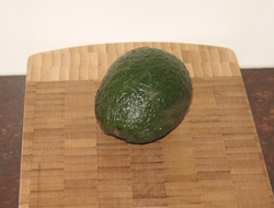 An avocado: an unsweet fruit
